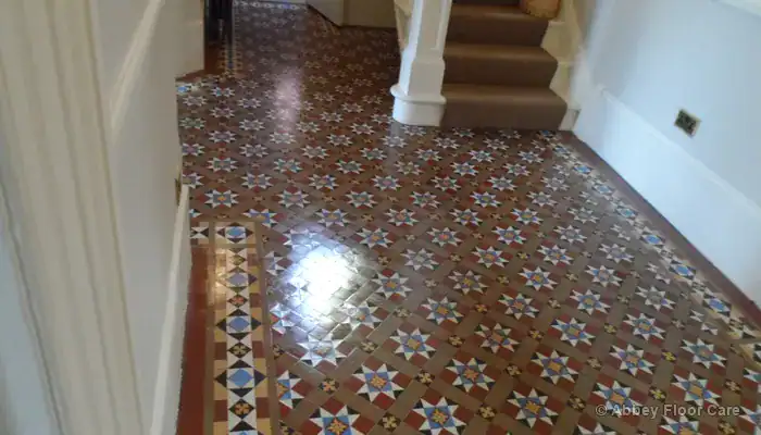 Assessment of a Victorian tile floor before deciding if a high-gloss sealer is suitable